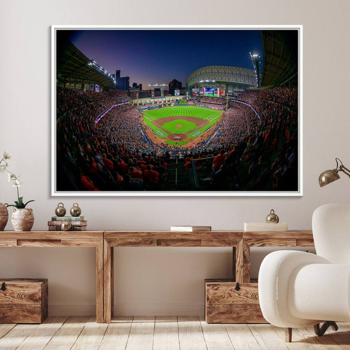 A canvas print of Houston Minute Maid Park at dusk is mounted on the wall.