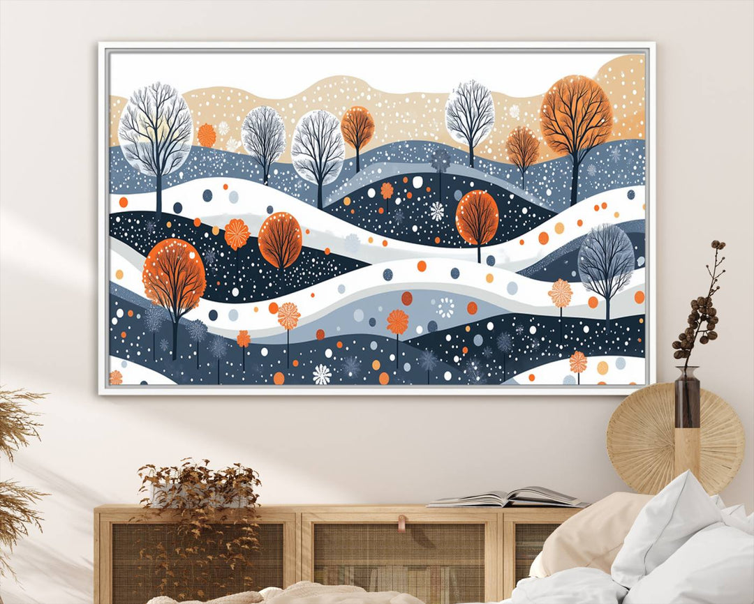 The "Abstract Winter Landscape Canvas Wall Art Print," featuring a triptych of landscapes with trees and hills in vibrant orange, white, and blue hues, adds a gallery-quality finish that transforms the space into an art lover's dream.