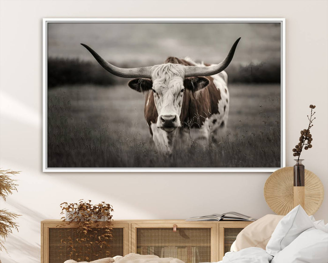 The Texas Longhorn Cow Canvas Wall Art Print adds a rustic touch to a living room.