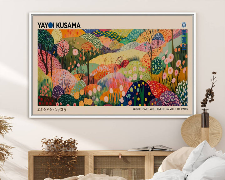 A framed Yayoi Kusama Wall Art Canvas Print features a vibrant abstract landscape adorned with flowers.