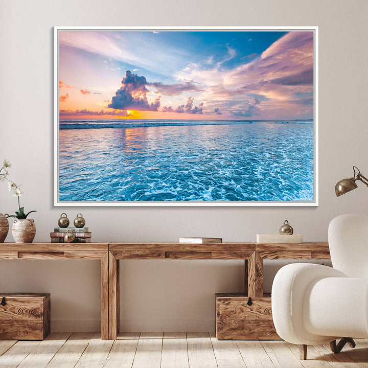 An Ocean Sunset Canvas Wall Art depicting a vibrant sky and rolling waves.