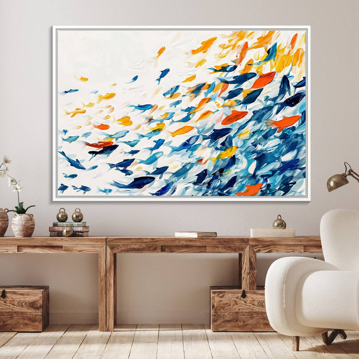 A colorful Abstract Fish Shoal Canvas Print hangs on the wall.