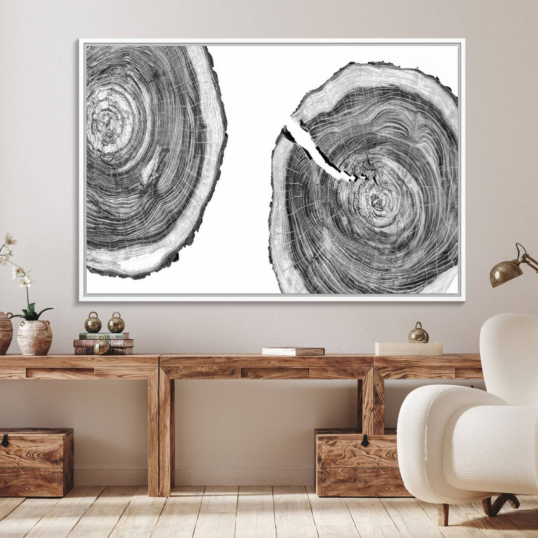 The modern black and white tree rings canvas art adds minimalist geometric decor with nature inspiration.