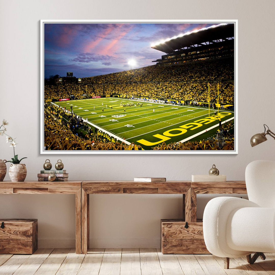 This gallery-quality canvas print features a depiction of the OREGON field filled with fans at sunset, capturing the essence of the University of Oregon Ducks Autzen Stadium.