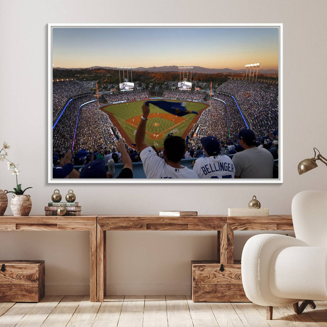 A triple canvas wall art captures the scene at Dodger Stadium, with fans cheering as the sun sets and a flag waving on the field.