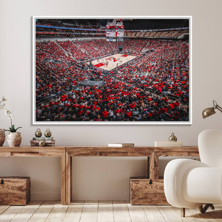 A painting of Louisville Cardinals fans in red at the KFC Yum Center Arena.