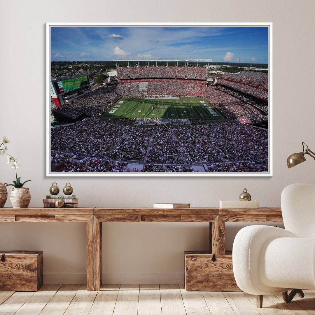 The wall art is a South Carolina Gamecocks print, showcasing Williams-Brice Stadium from a distance under clear skies.