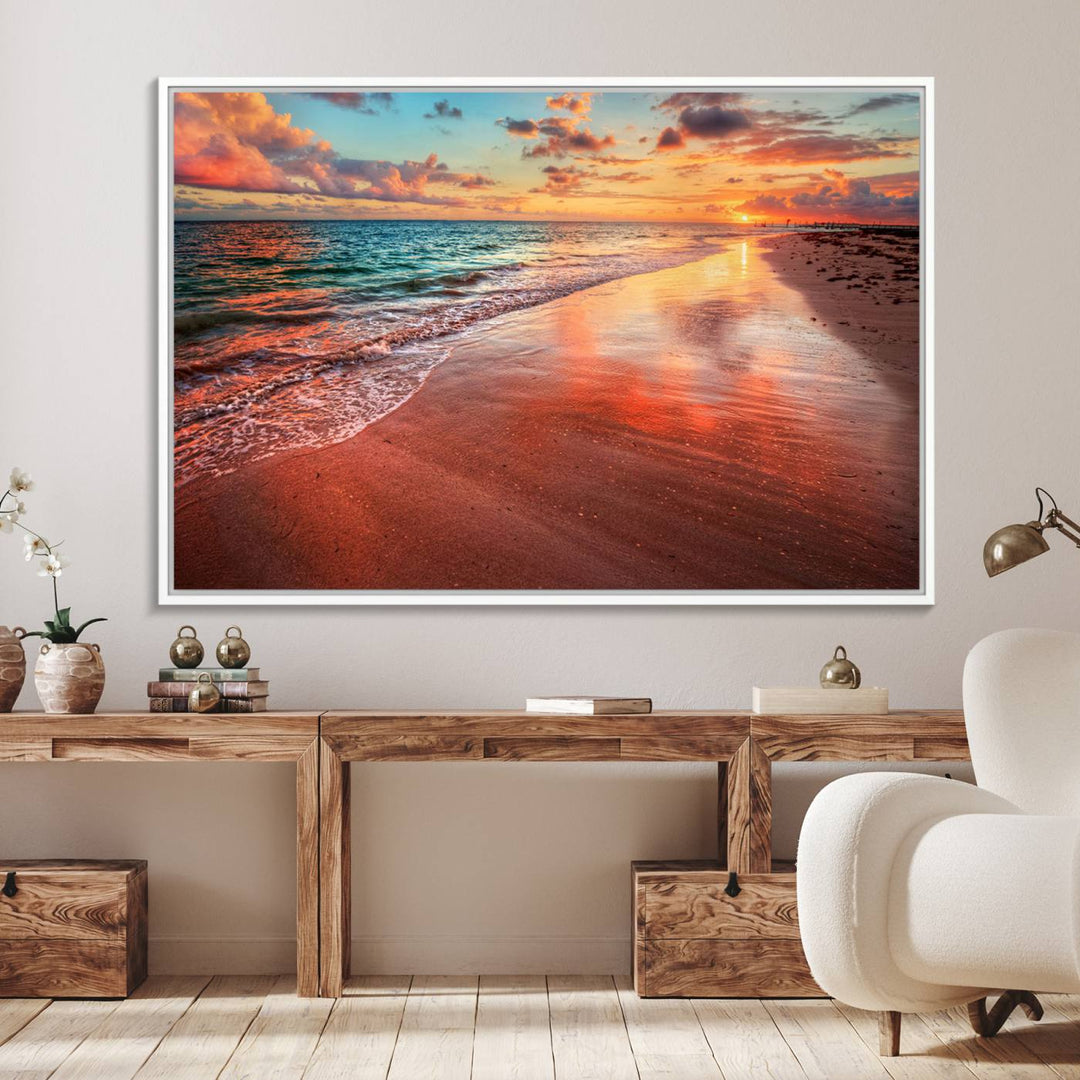 An Ocean Canvas Print depicts a sunset over a beach with reflections.