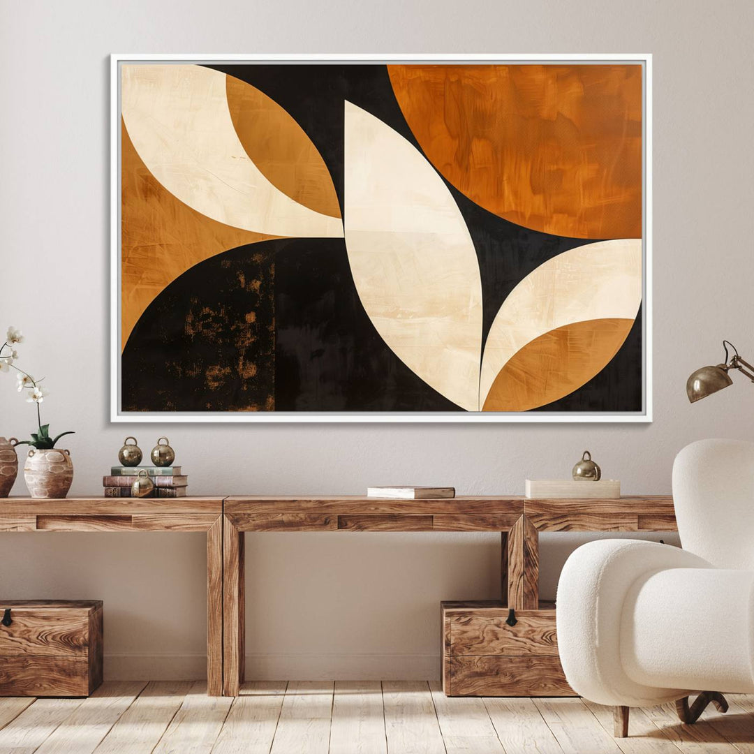 Geometric abstract wall art print featuring leaf shapes in brown, beige, and black.