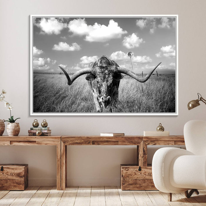 Longhorn Cow Field Canvas Print featuring rustic charm with a windmill backdrop.