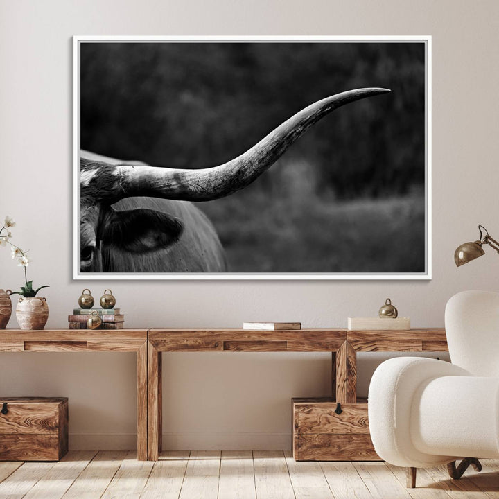 Cow Longhorn Wall Art: This black and white print adds rustic charm.