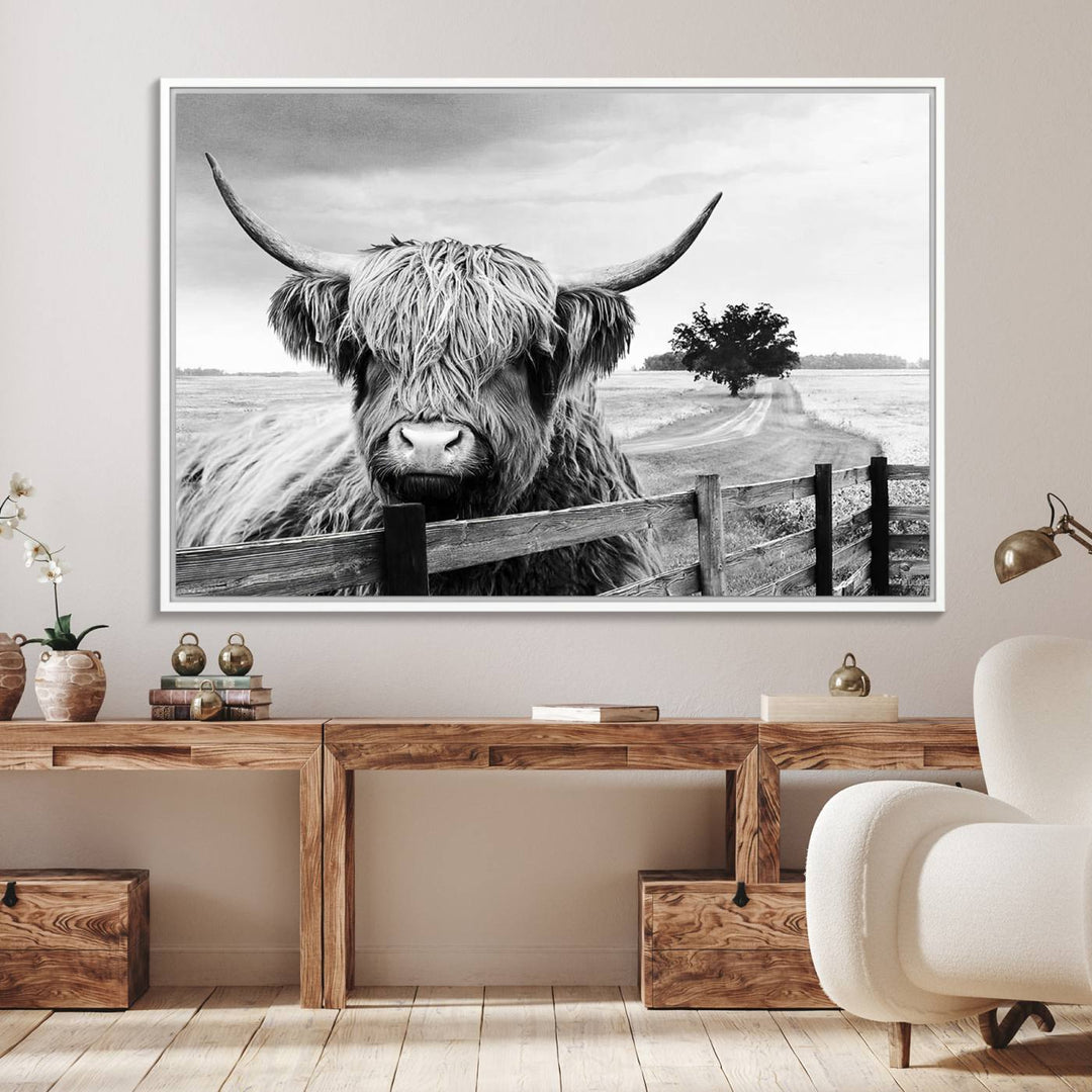 The Scottish Highland Cow Wall Art, a black and white canvas print, enhances rustic farmhouse décor.