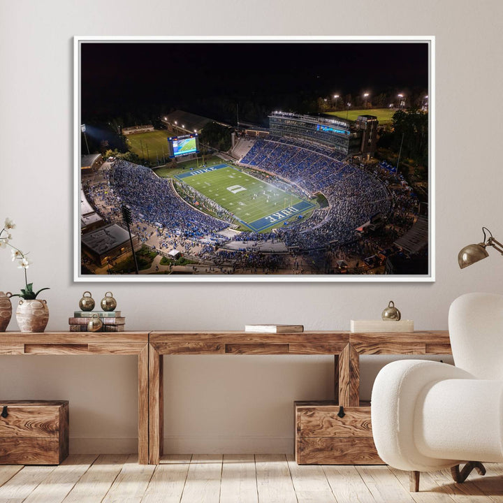 Night aerial view of packed Duke Blue Devils Wallace Wade Stadium, surrounded by trees and illuminated by lights; perfect for high-resolution prints.