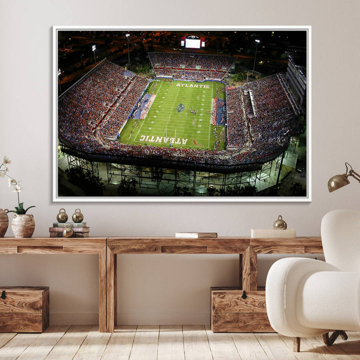 Gallery-quality wall art complements the view of the FAU Stadium with Florida Atlantic University Owls on the field in a night aerial setting.