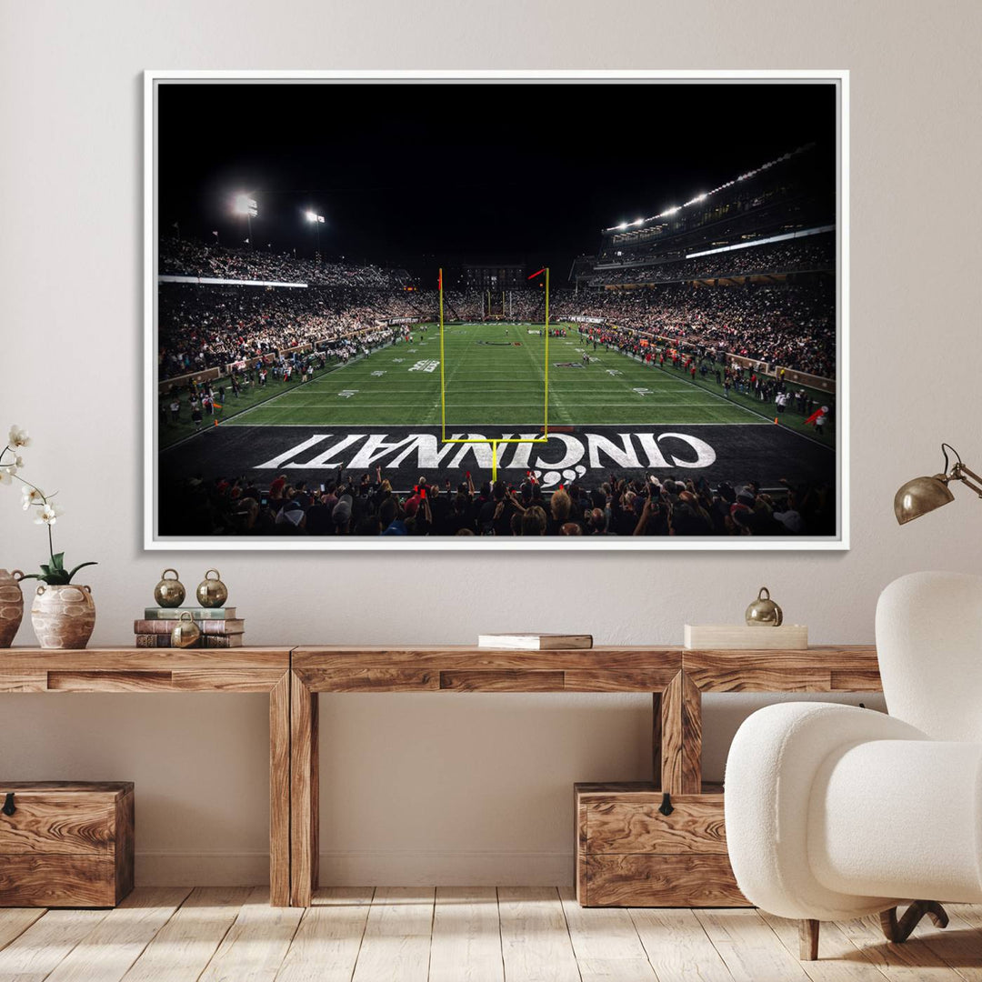 Interior view featuring a Cincinnati Bearcats football canvas of Nippert Stadium.