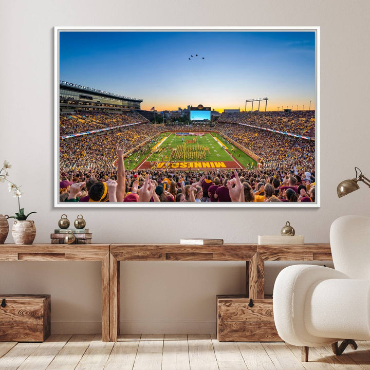 Canvas wall art featuring the University of Minnesota Football Team print, showcasing Huntington Bank Stadium at sunset with jets overhead.