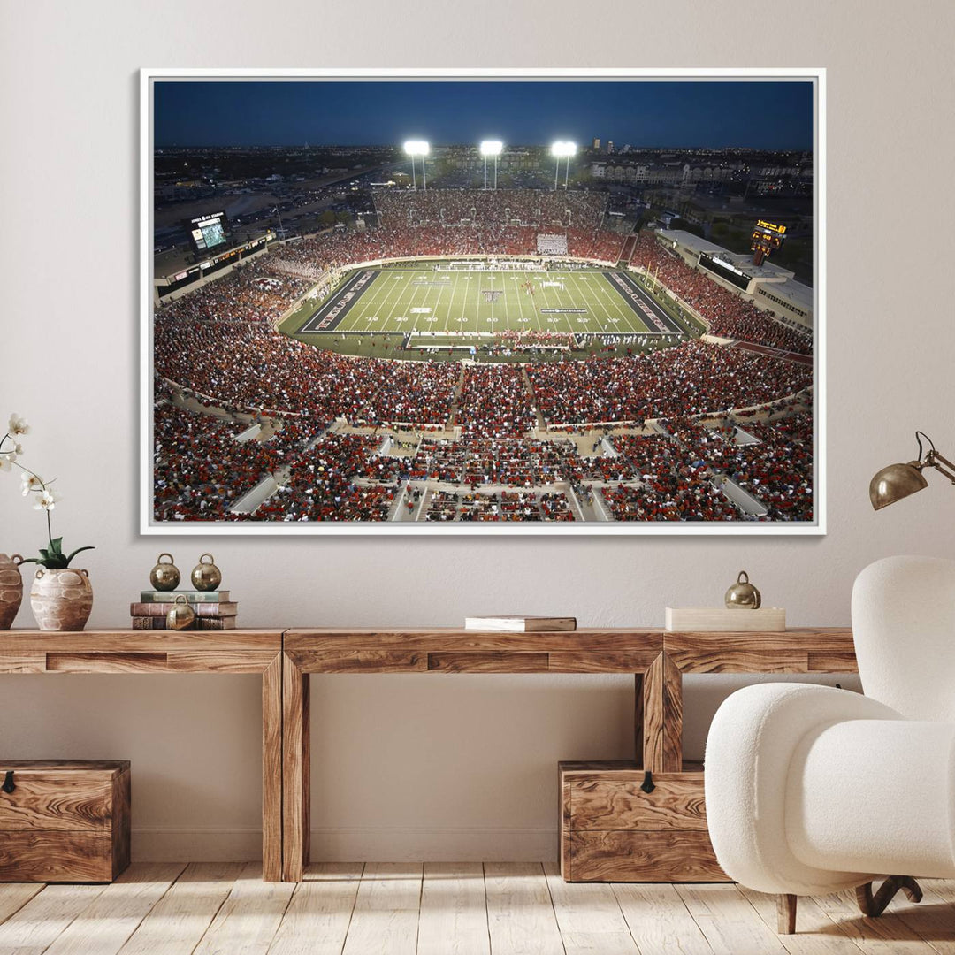 Canvas wall art featuring an aerial view of the Texas Tech Red Raiders packed night game at Lubbock’s Jones AT&T Stadium.