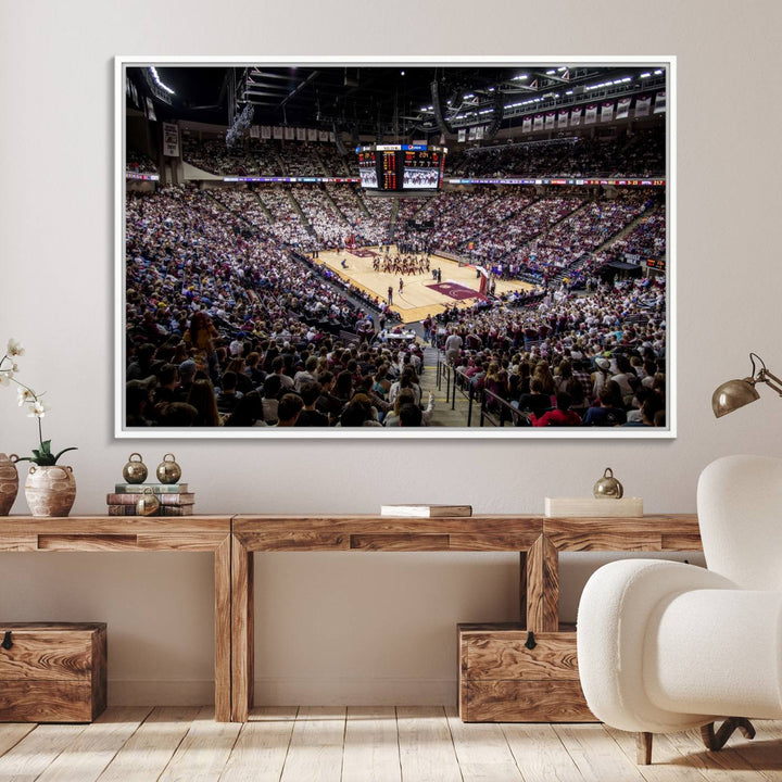 The Nebraska Basketball Arena Wall Art Canvas features an arena filled with Cornhuskers fans and players beneath a scoreboard.