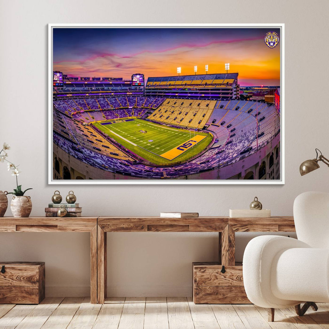 A canvas print of Tiger Stadium at sunset, depicting an empty field and stands, adorns the wall.