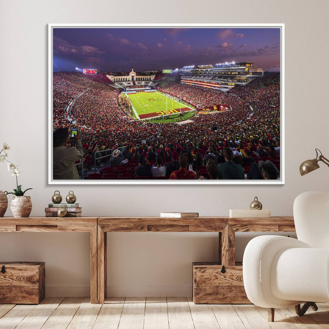 The vibrant wall art canvas print captures the USC Trojans playing under lights at dusk in LA Memorial Coliseum.