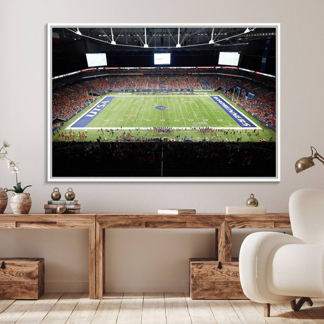 The UTSA Roadrunners game at Alamodome canvas print captures the scene from above, displaying fans and the UTSA lettering on the field.