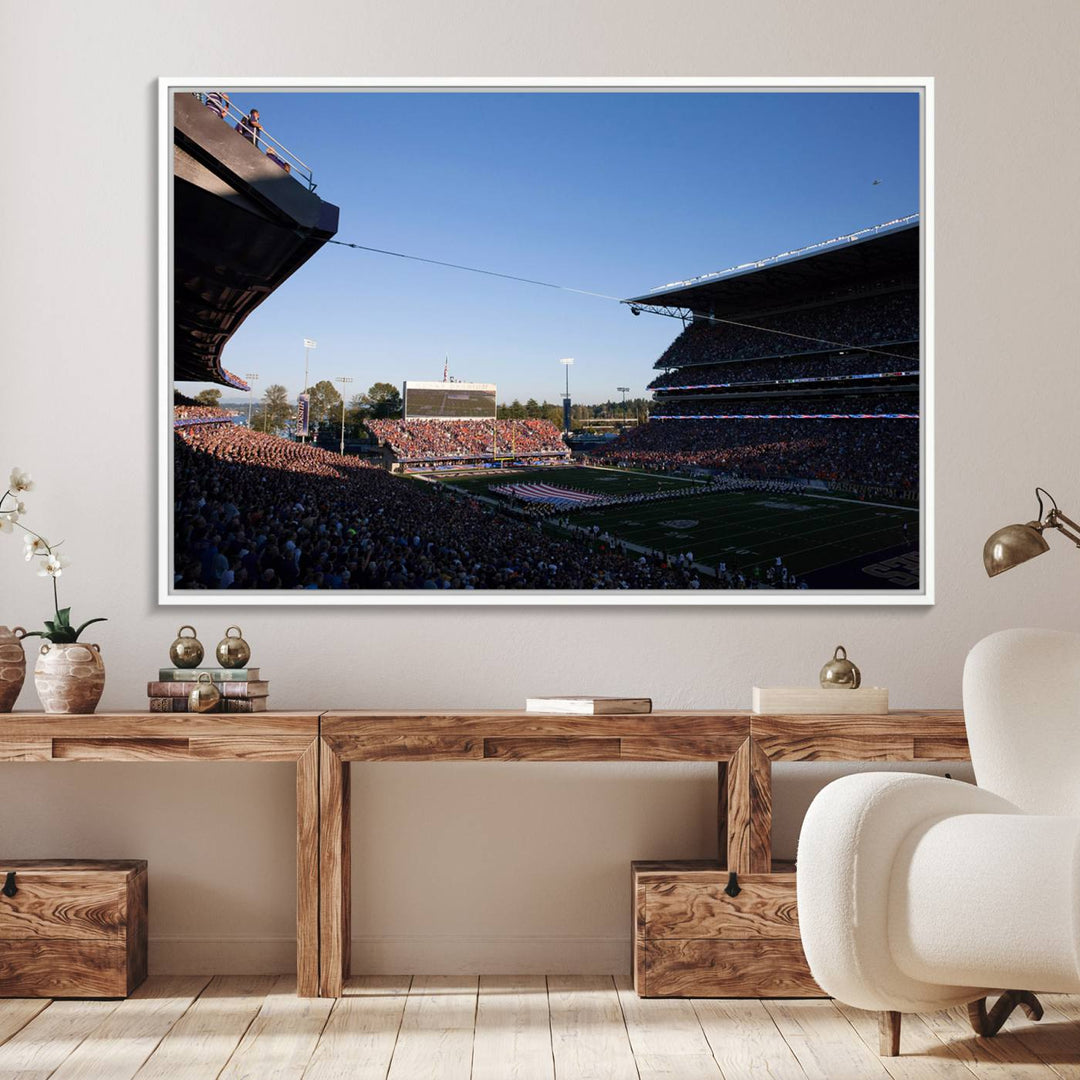 The University of Washington Huskies wall art print depicts Husky Stadium coming alive with fans as flags flutter.