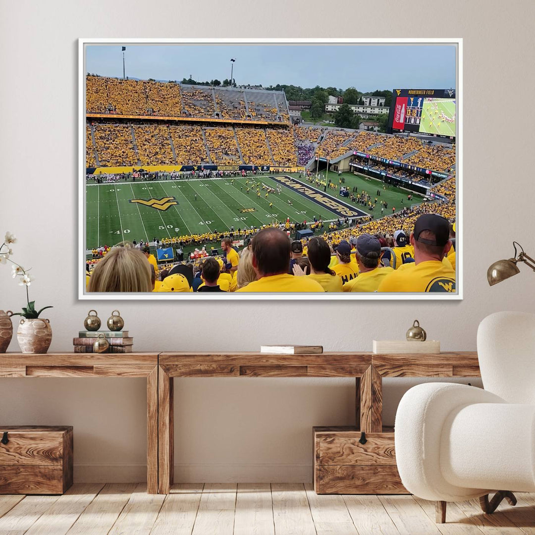 A Puskar Stadium canvas print decorates the modern living room shelf.