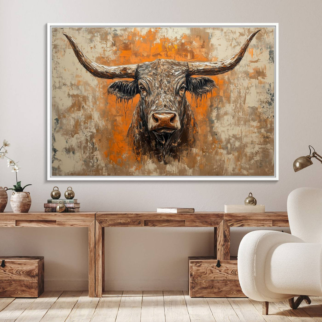 Abstract Cow Longhorn Bull Wall Art presents a detailed face centered on a textured orange and beige background.