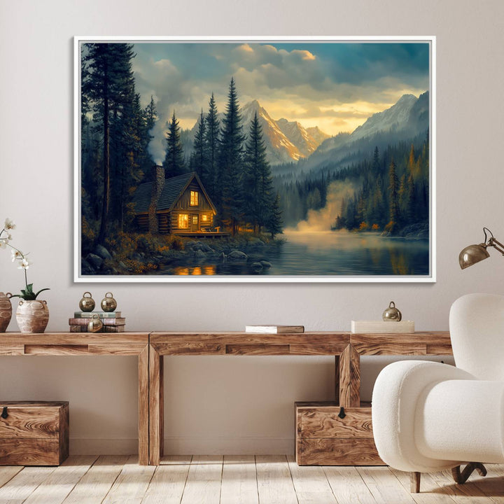 Serene sunset lake wall art: a cozy mountain cabin with lights, framed by pine trees and set against a moody sky. Ideal for adding rustic lodge charm to your space.