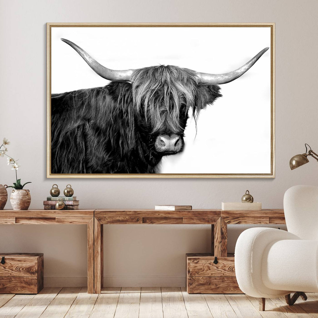 The Black and White Highland Cow Multi Panel Wall Art Canvas Print with UV-protection hangs prominently.