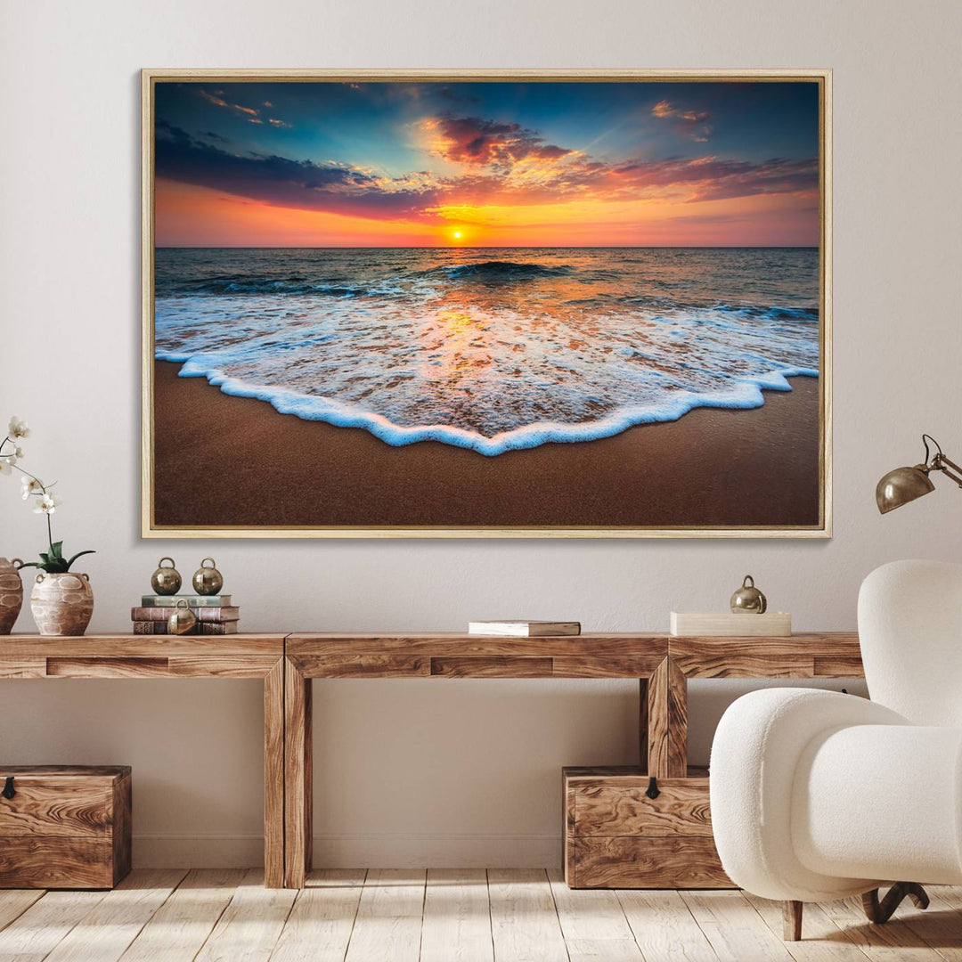 A Sunset with Calm Waves on the Beach Wall Art Canvas Print adorns the dining room.