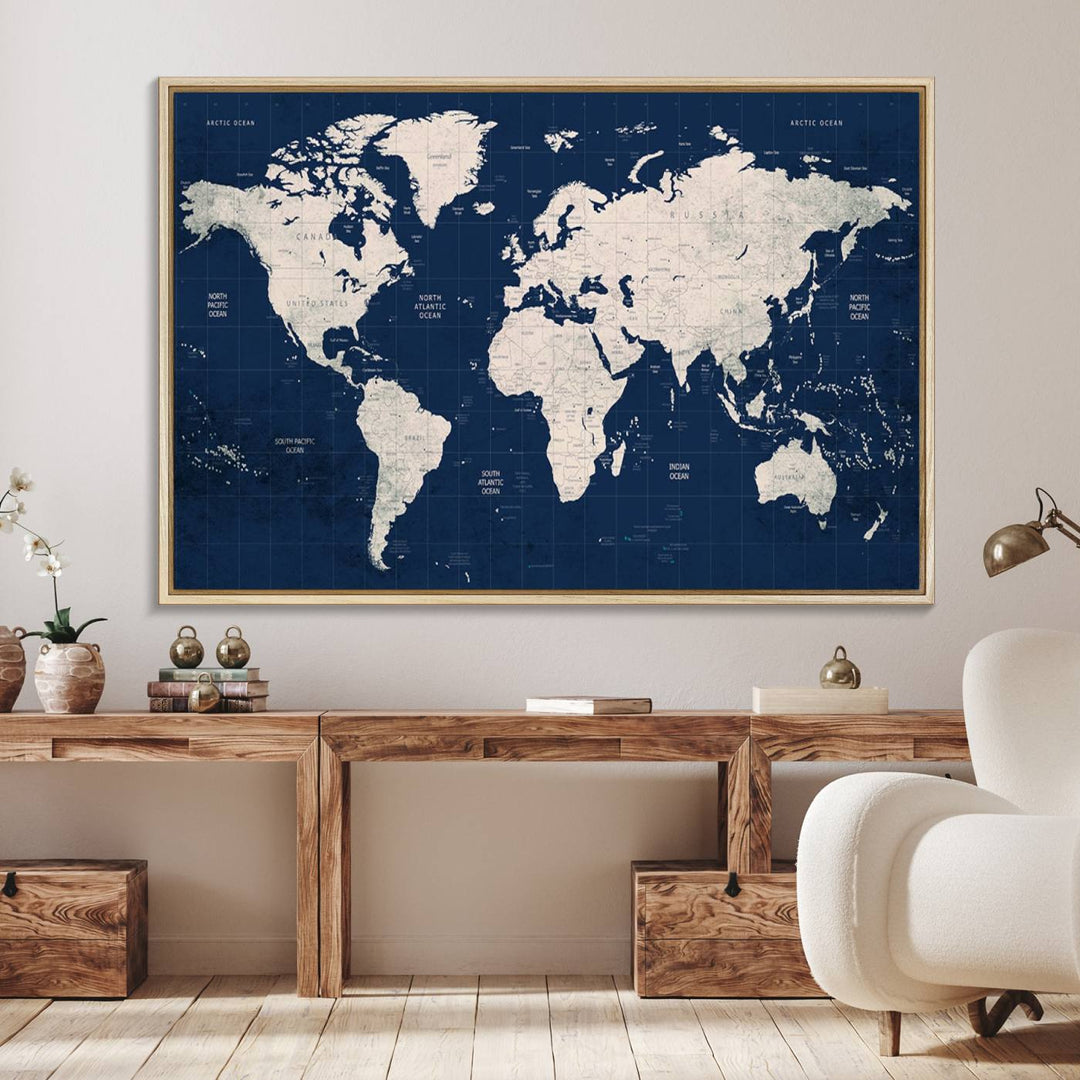 Large modern world map wall art canvas print in beige and navy; showcases a 3-panel vintage map design and is ready to hang.