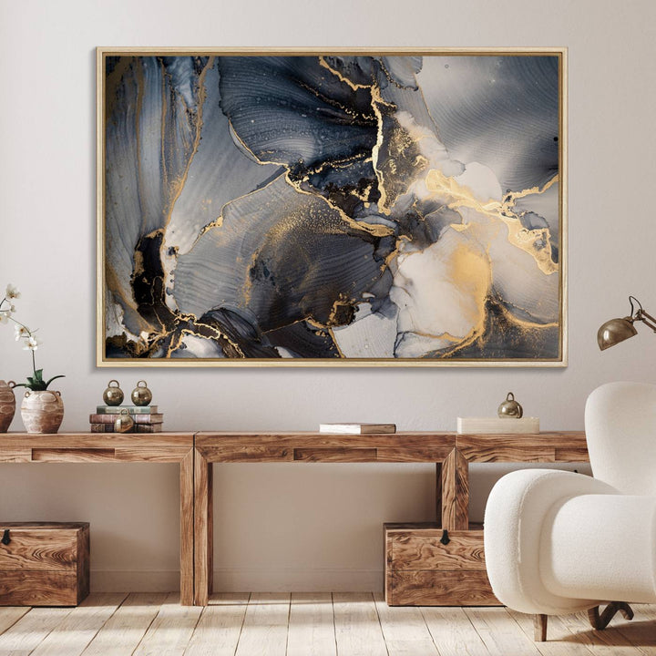 A Modern Marble Fluid Effect Abstract Wall Art with black, white, and gold swirls hangs in a modern kitchen.