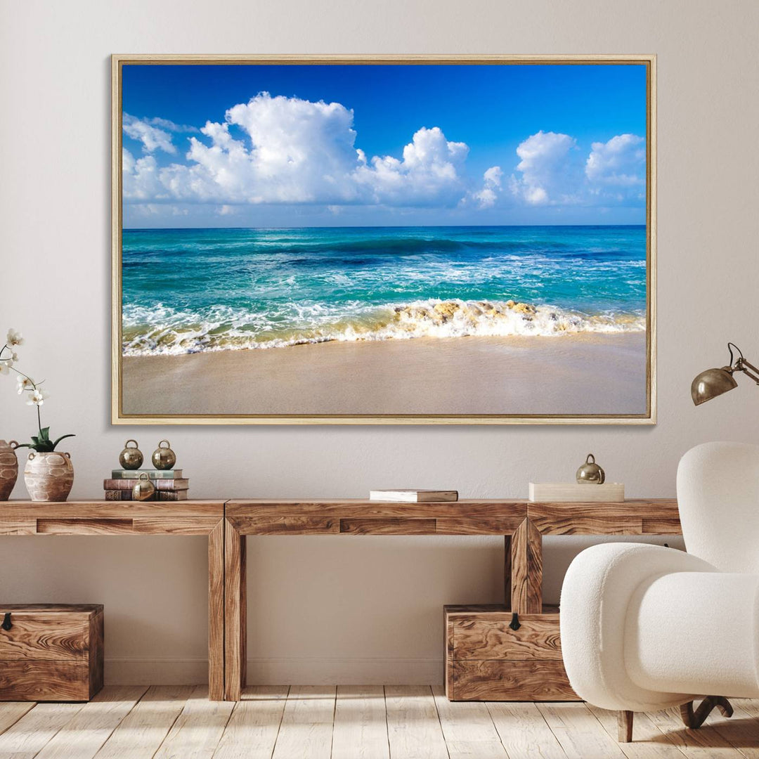 The Tropical Beach 3-Panel Canvas Wall Art features ocean waves gently lapping on a beach under blue skies, making it an ideal choice for coastal decor.