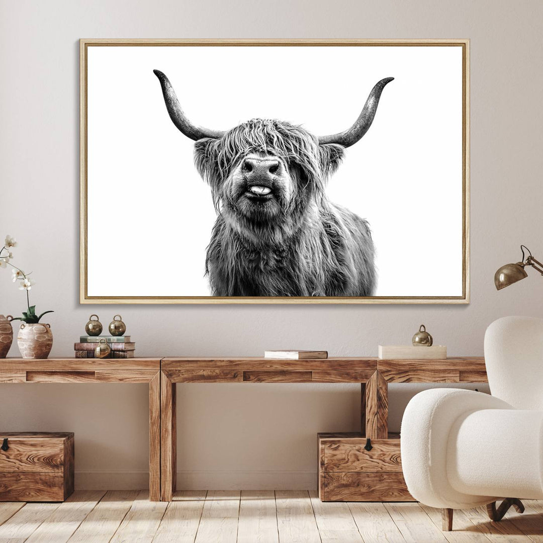 The Fanny Highland Cow art print decorates the modern kitchen, featured in black and white.