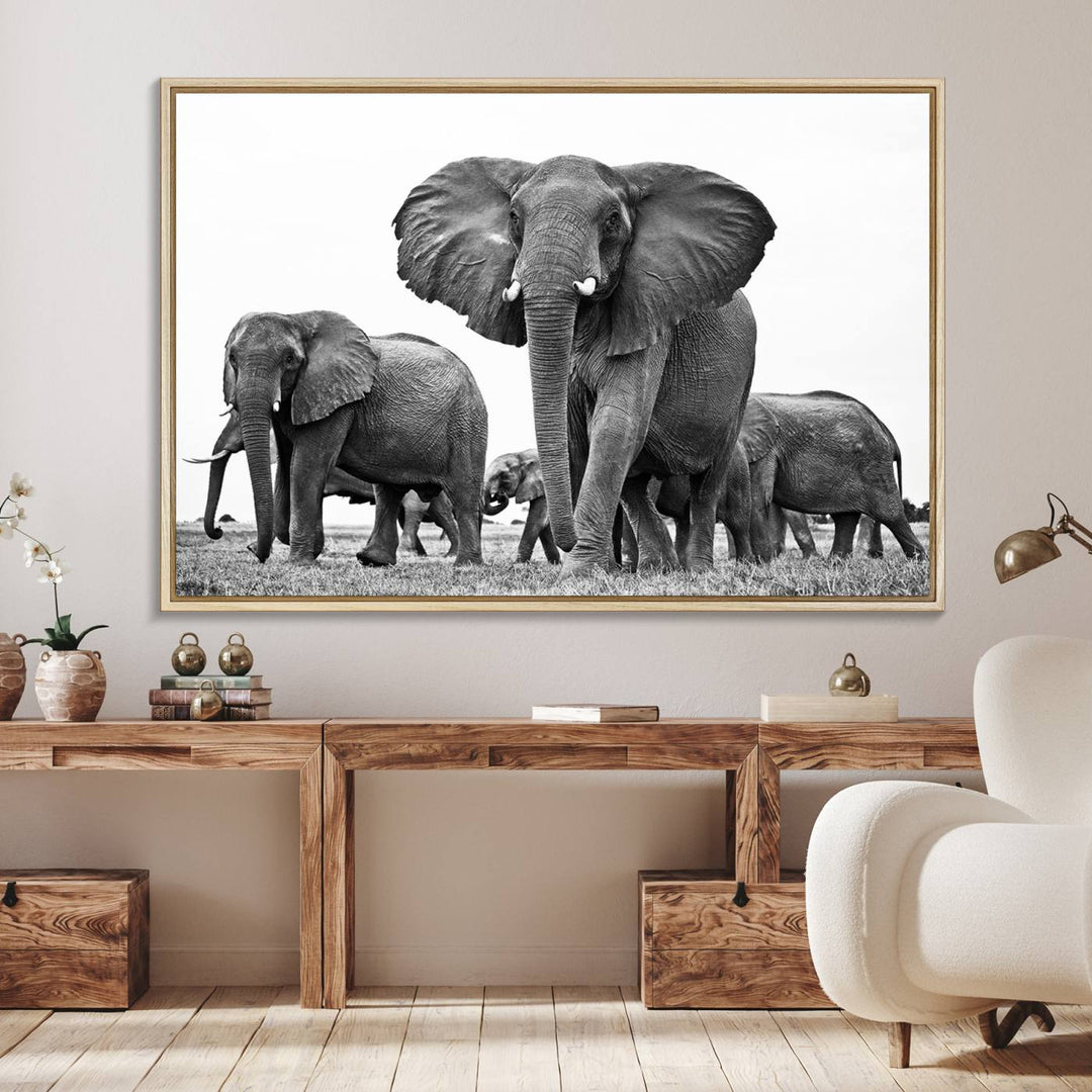 A modern dining area features a Black White Elephant Family Wall Art Canvas Print.