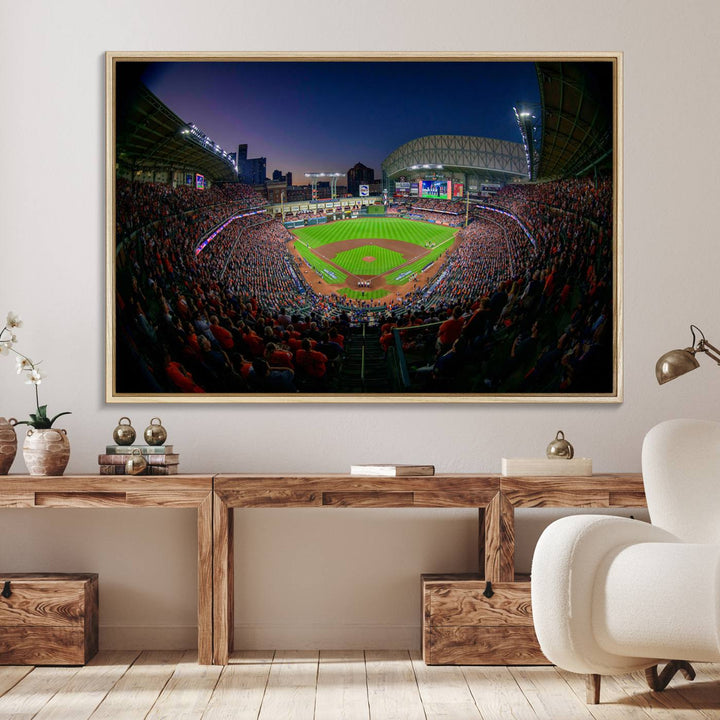 A canvas print of Houston Minute Maid Park at dusk is mounted on the wall.