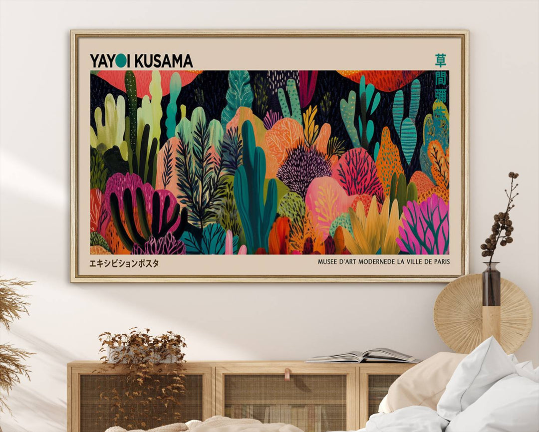 The vibrant canvas print of wall art features abstract plants, with the elegant text "Yayoi Kusama Wall Art Canvas Print" displayed on the colorful frame.