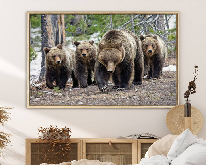 The Grizzly 399 and Cubs in Wild Flowers Wall Art Canvas Print, depicting grizzly bears amidst wildflowers, is elegantly displayed.