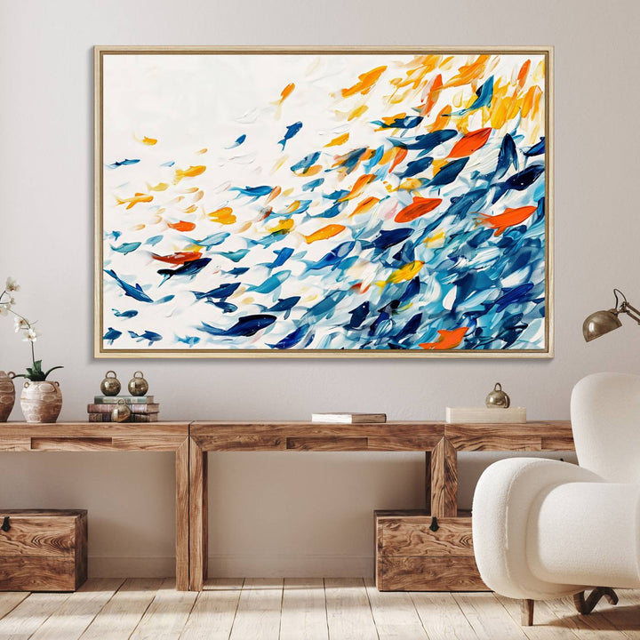 A colorful Abstract Fish Shoal Canvas Print hangs on the wall.