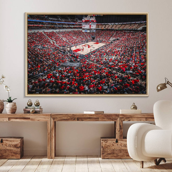 A painting of Louisville Cardinals fans in red at the KFC Yum Center Arena.