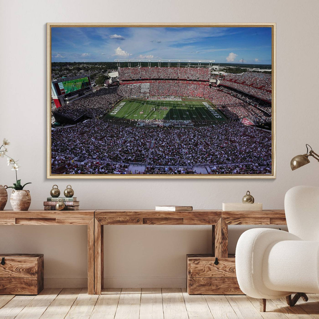 The wall art is a South Carolina Gamecocks print, showcasing Williams-Brice Stadium from a distance under clear skies.