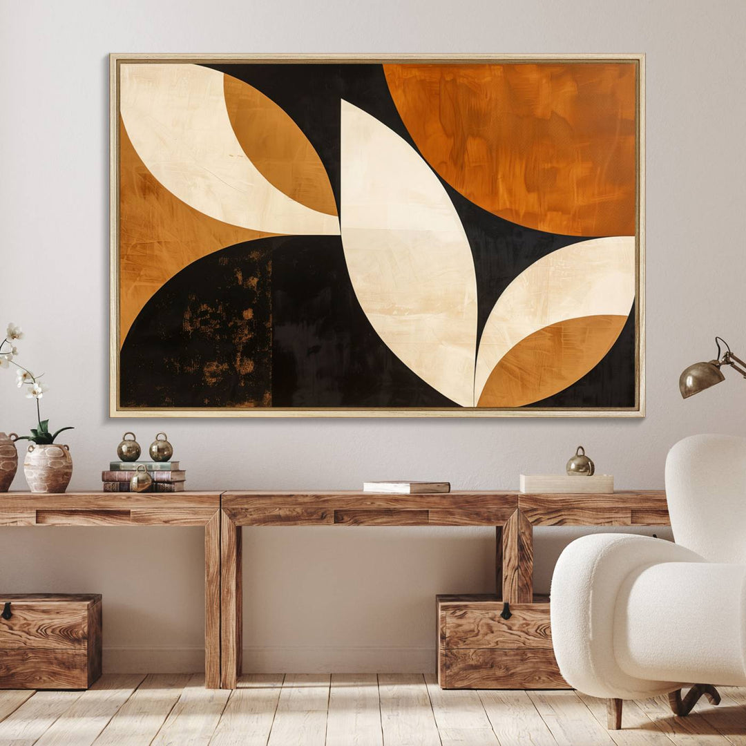 Geometric abstract wall art print featuring leaf shapes in brown, beige, and black.