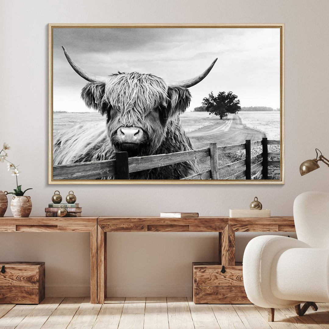 The Scottish Highland Cow Wall Art, a black and white canvas print, enhances rustic farmhouse décor.