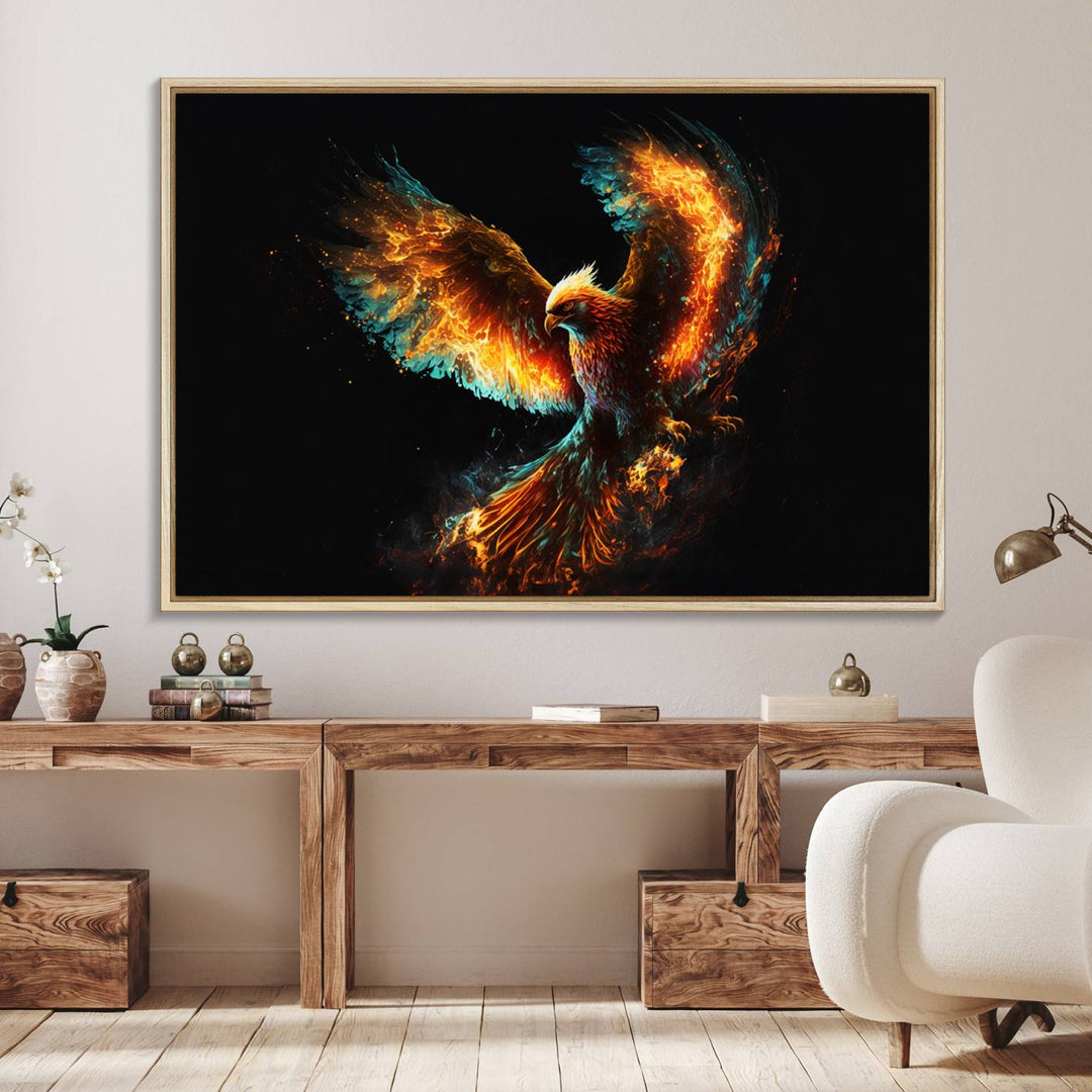 The Fiery Phoenix Canvas Print, showcasing a majestic bird with fiery wings against a black background, makes for the perfect bold decor in your living room.