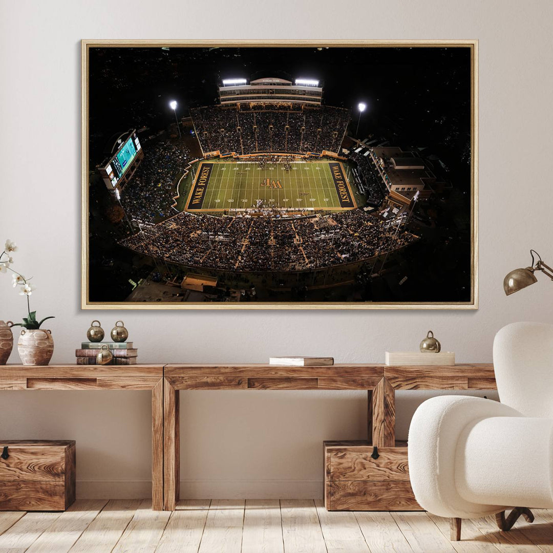 Canvas wall art displays an aerial view of Wake Forest Demon Deacons stadium at night.