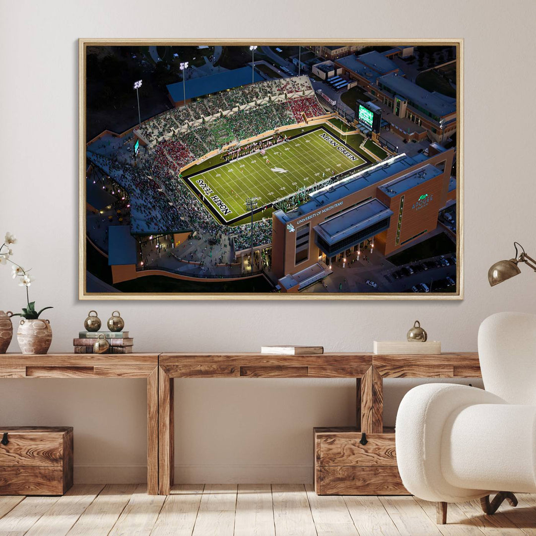 Night aerial view of fans at UNT Mean Green game captured on premium DATCU Stadium canvas wall art print.