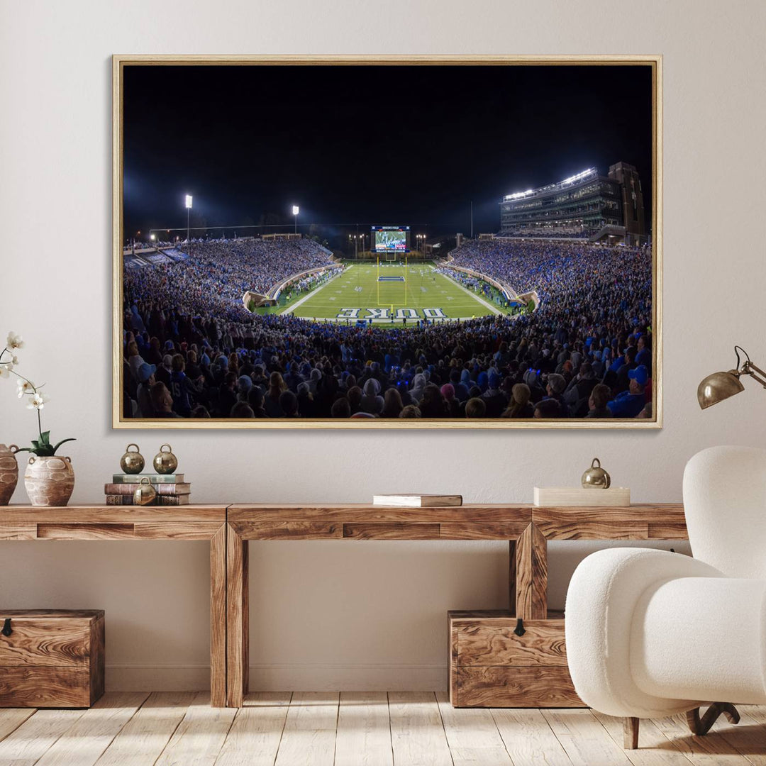 Under bright lights at night, the Duke Blue Devils Football Team Durham canvas wall art print is prominently displayed.