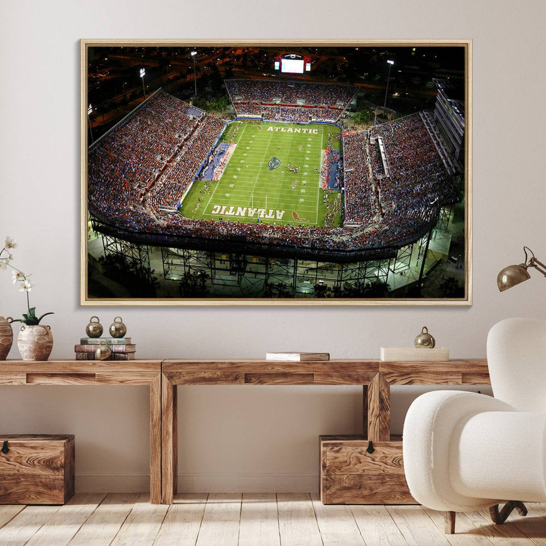 Gallery-quality wall art complements the view of the FAU Stadium with Florida Atlantic University Owls on the field in a night aerial setting.