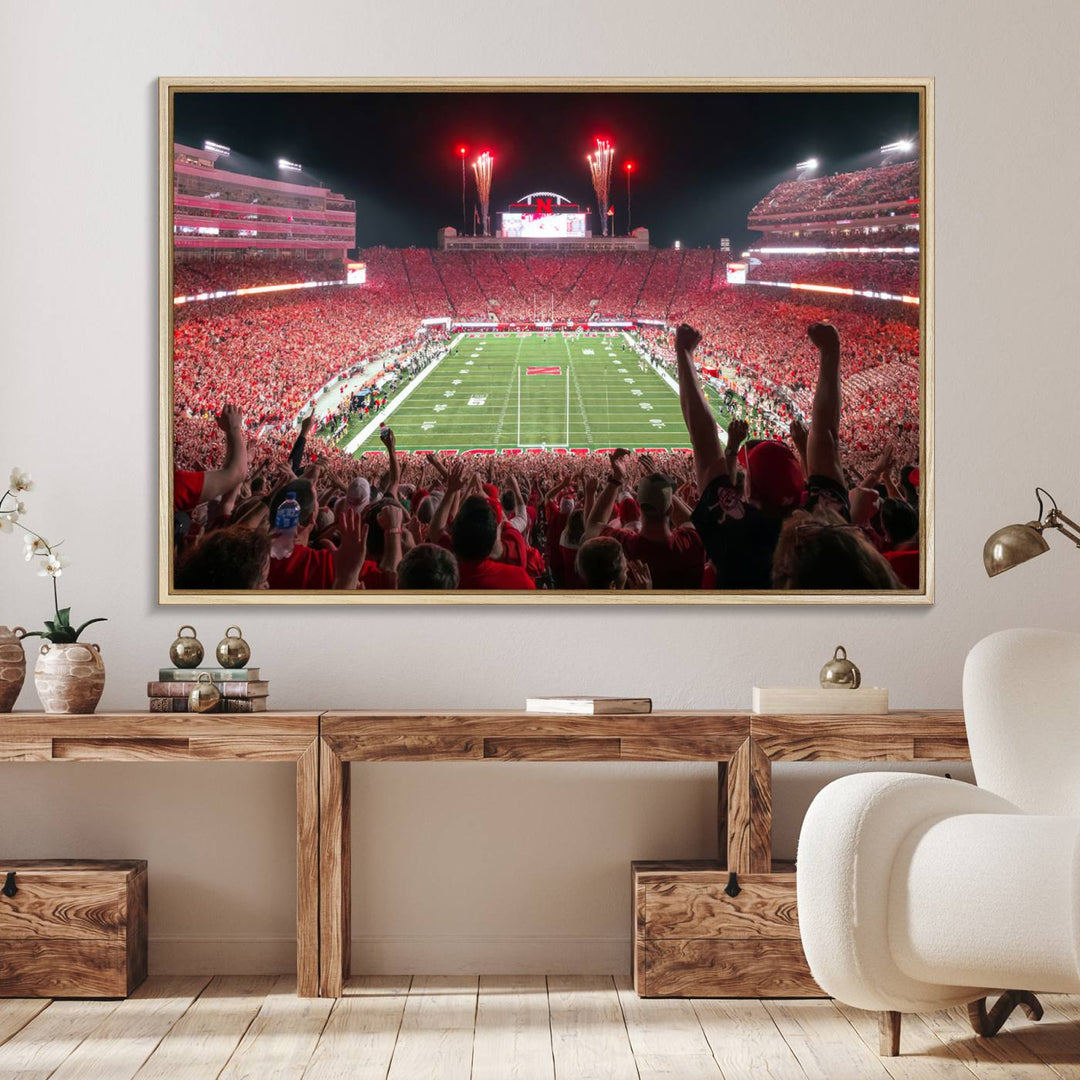 A vibrant canvas print of the Lincoln Memorial Stadium at night with fireworks, featuring the University of Nebraska Cornhuskers Football.